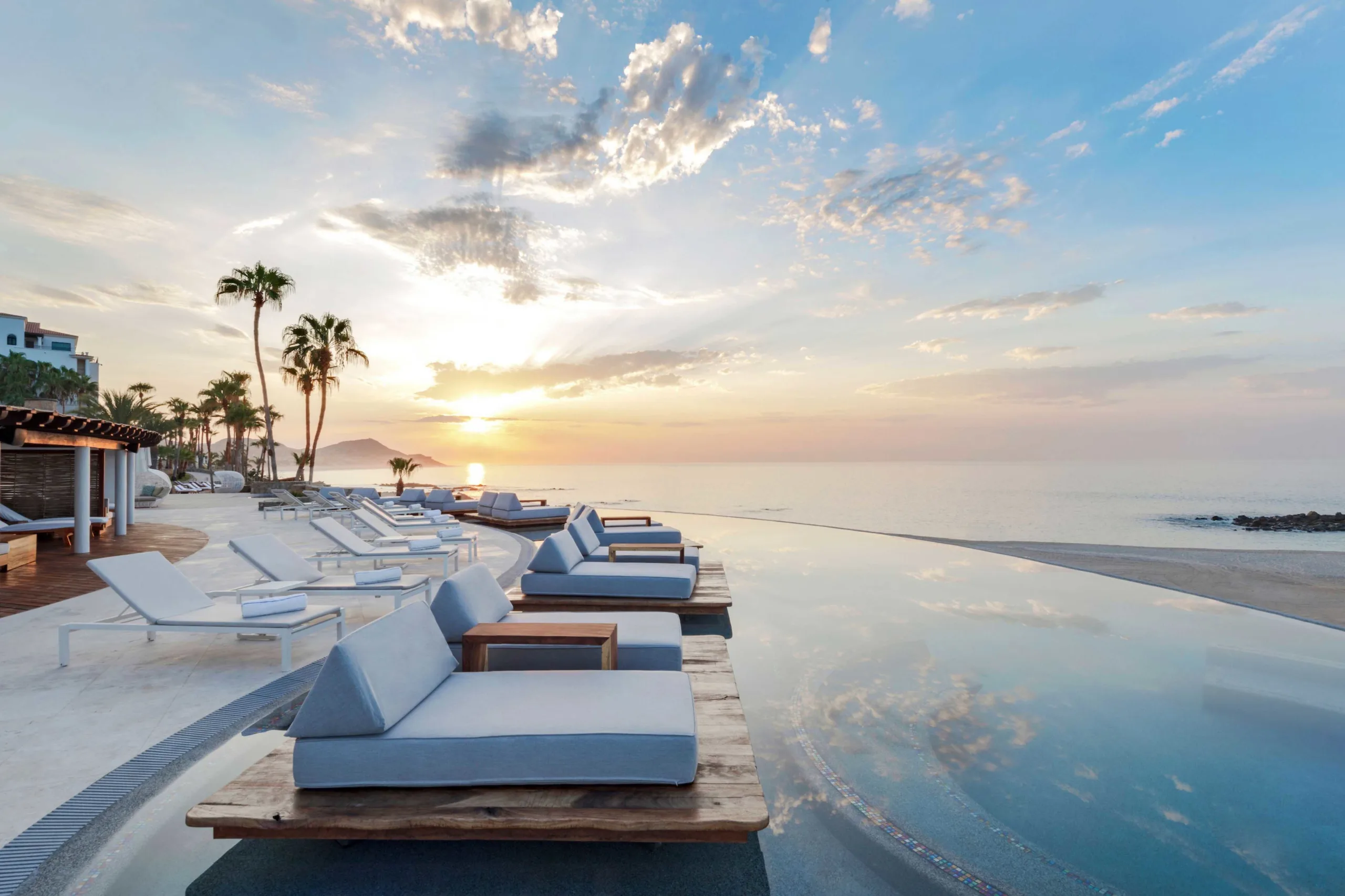 Hilton Los Cabos infinity pool at sunset